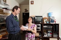 Man and woman holding books