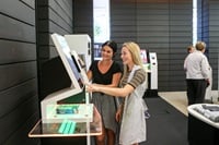 Two women looking at a computer screen